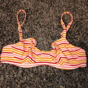 orange shades and pink bathing suit